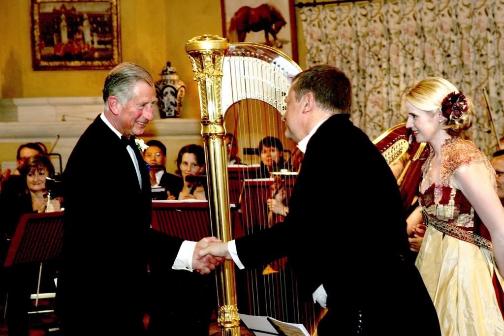 HRH The Prince of Wales congratulating Patrick after the premiere of the Highgrove Suite